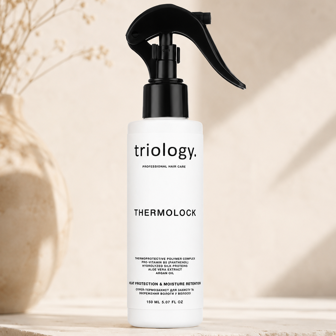 Triology Thermolock Heat Protectant Spray (Спрей-термозахист для захисту та збереження вологи у волоссі), 150 мл