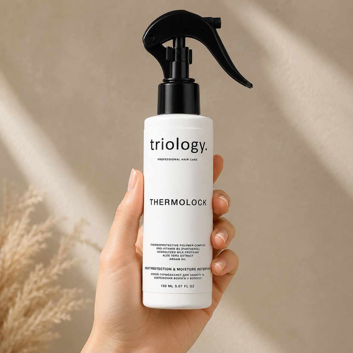 Triology Thermolock Heat Protectant Spray (Спрей-термозахист для захисту та збереження вологи у волоссі), 150 мл